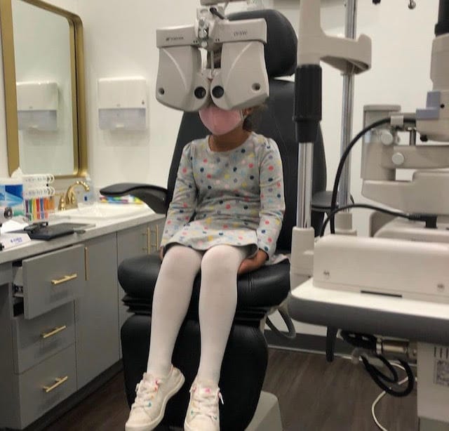Young Girl Getting Eye Exam