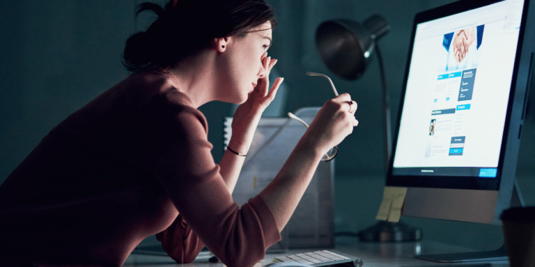 adult female suffering from eye strain due to digital screen time